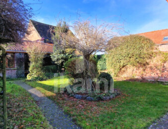 A Curgies, maison T8 de 159 m2 avec jardin, garage et dépendance